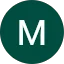 M B